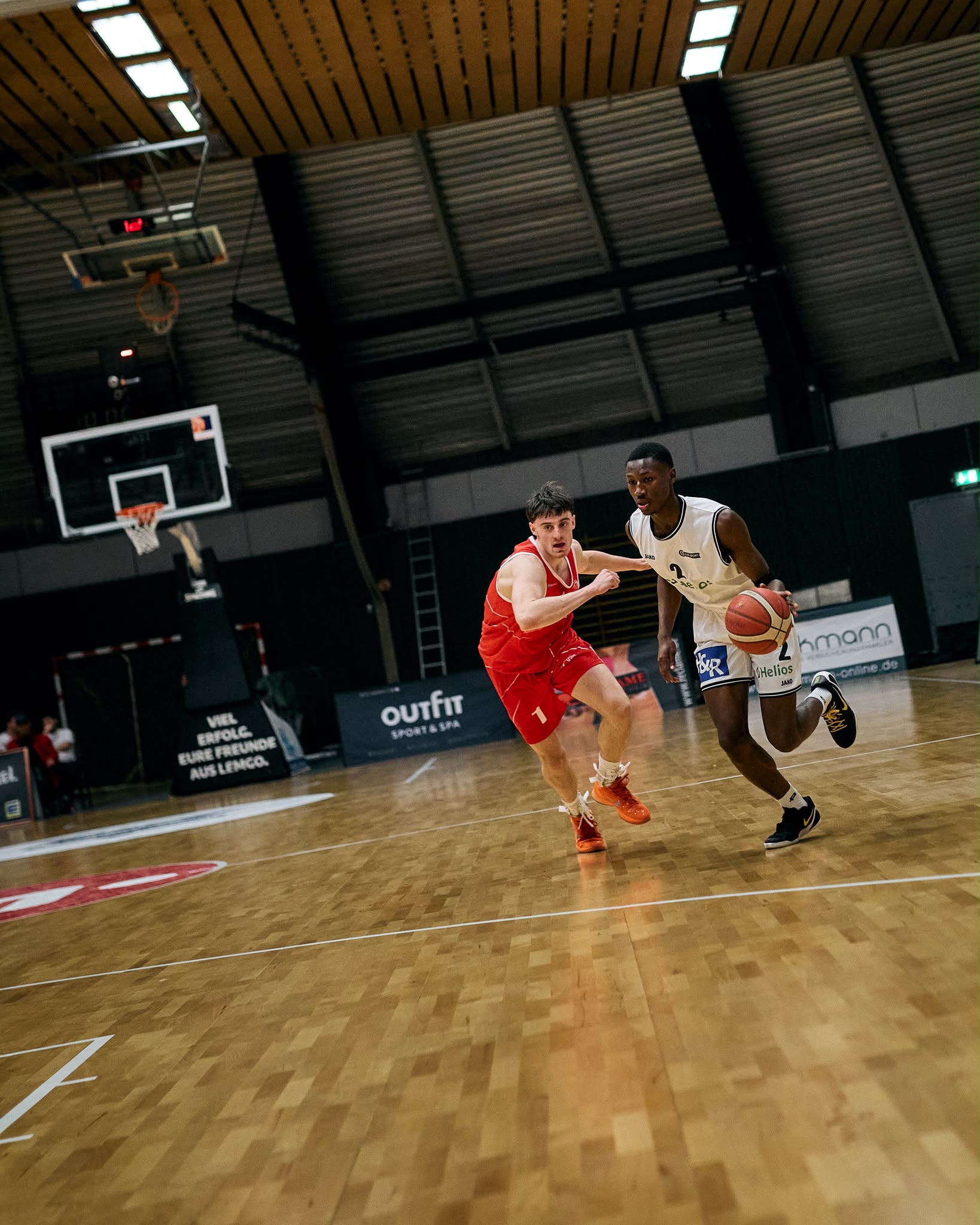 Bakary Coulibali driving past a defender